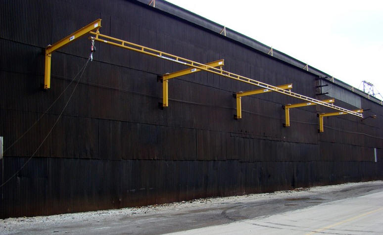 wall mount fold away fall arrest track fall restraint system